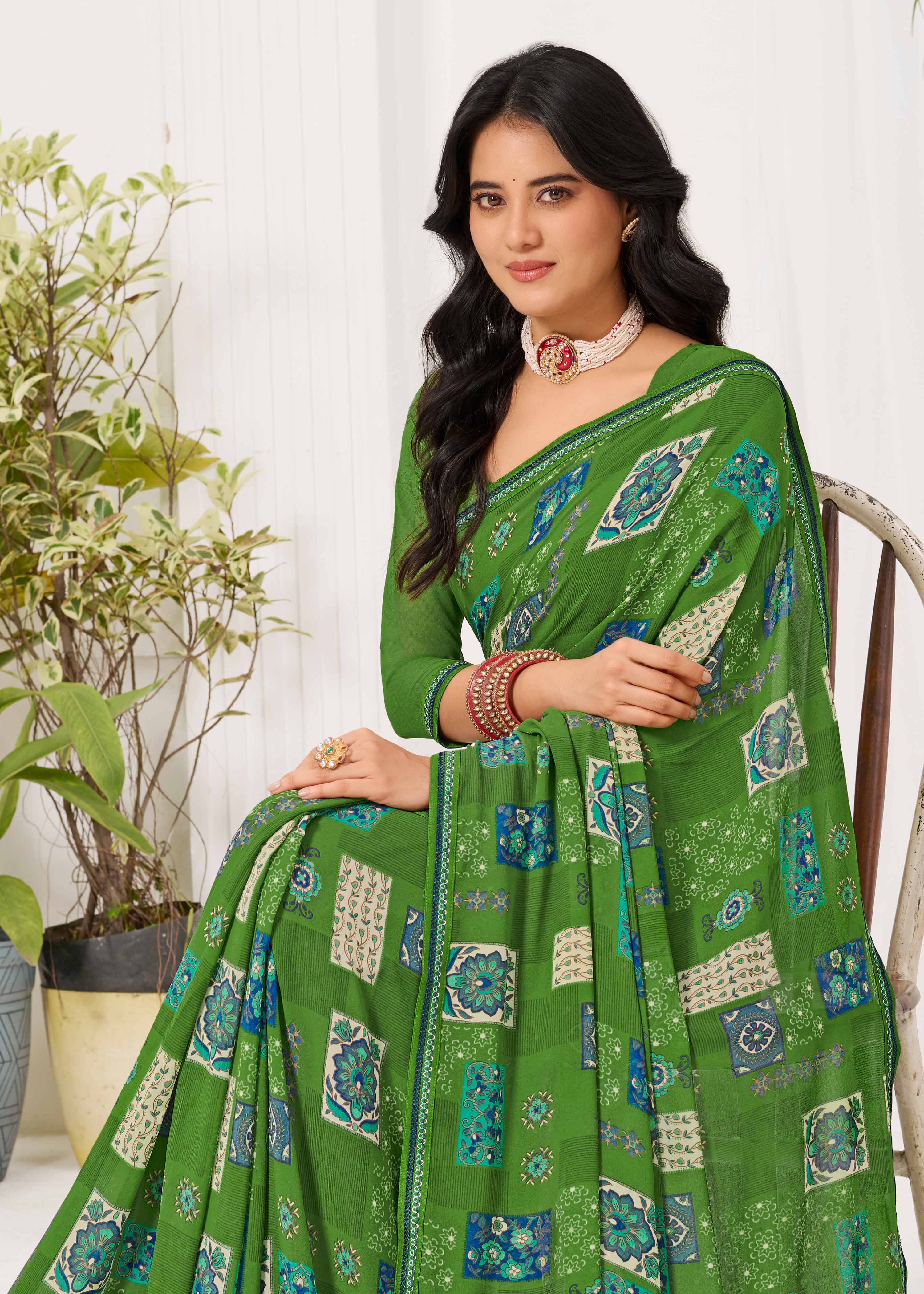 Laxmipati Radha Rani Floral Georgette Printed Saree in Green Color