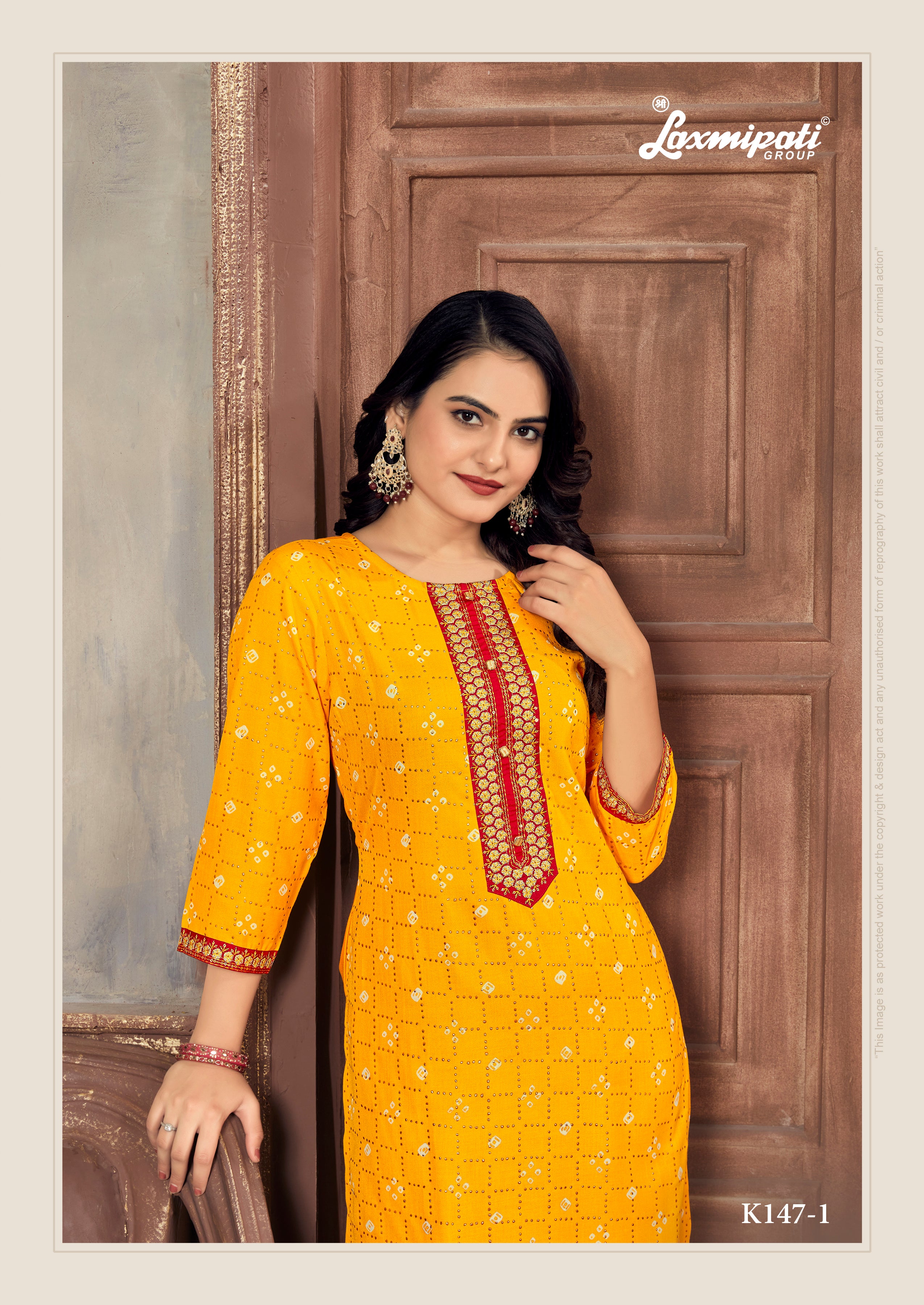 Laxmipati Spun Base Bright Yellow Embroidered Straight Cut Kurti With Pant