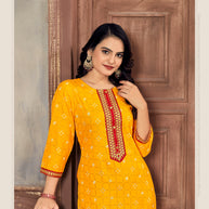 Laxmipati Spun Base Bright Yellow Embroidered Straight Cut Kurti With Pant