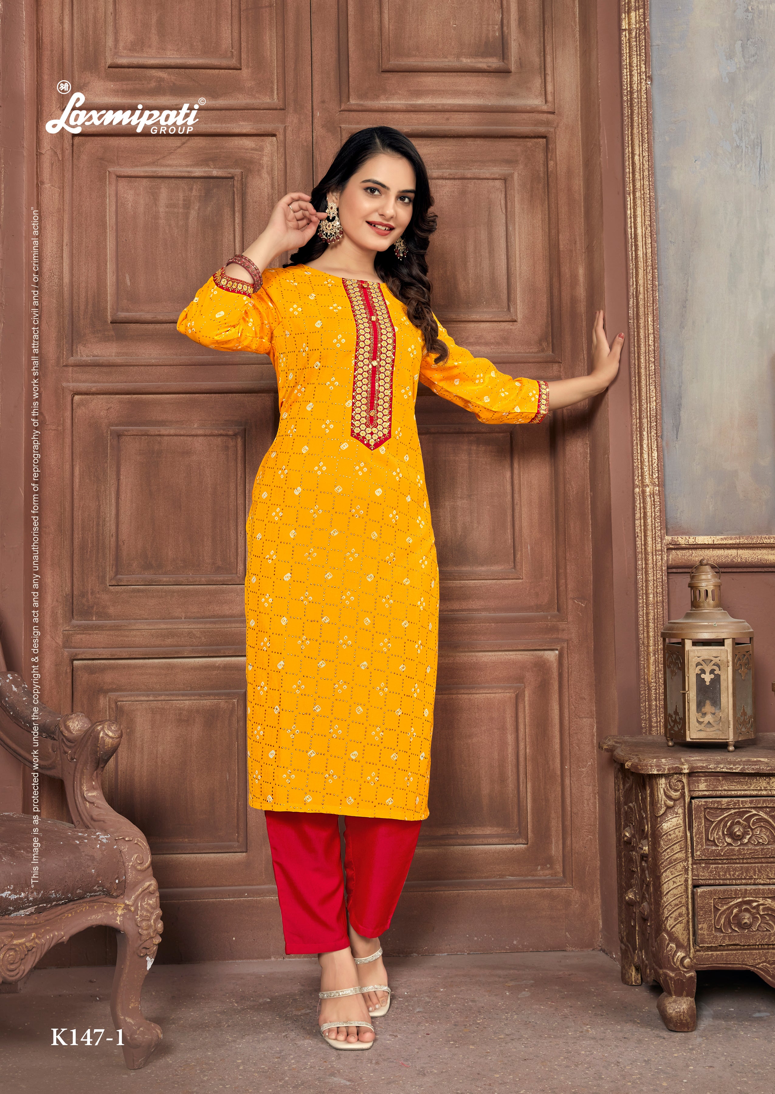 Laxmipati Spun Base Bright Yellow Embroidered Straight Cut Kurti With Pant