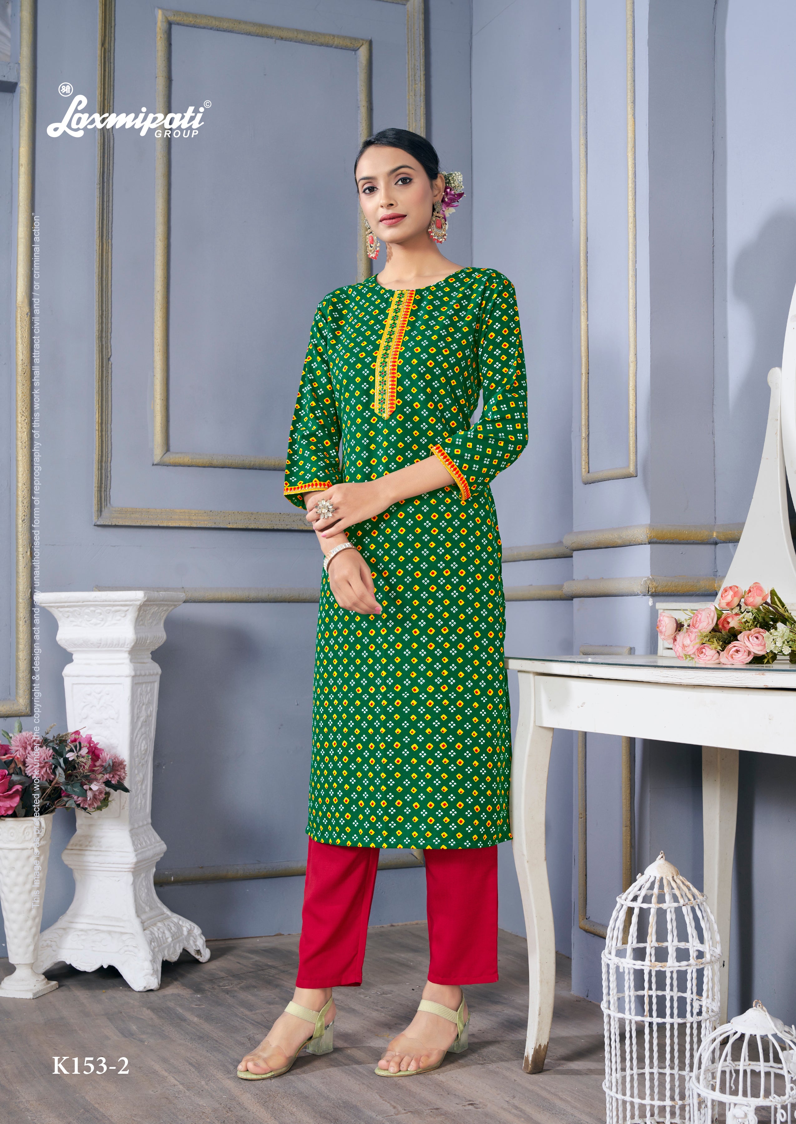 Laxmipati Spun Base Forest Green Straight Cut Embroidered Kurti