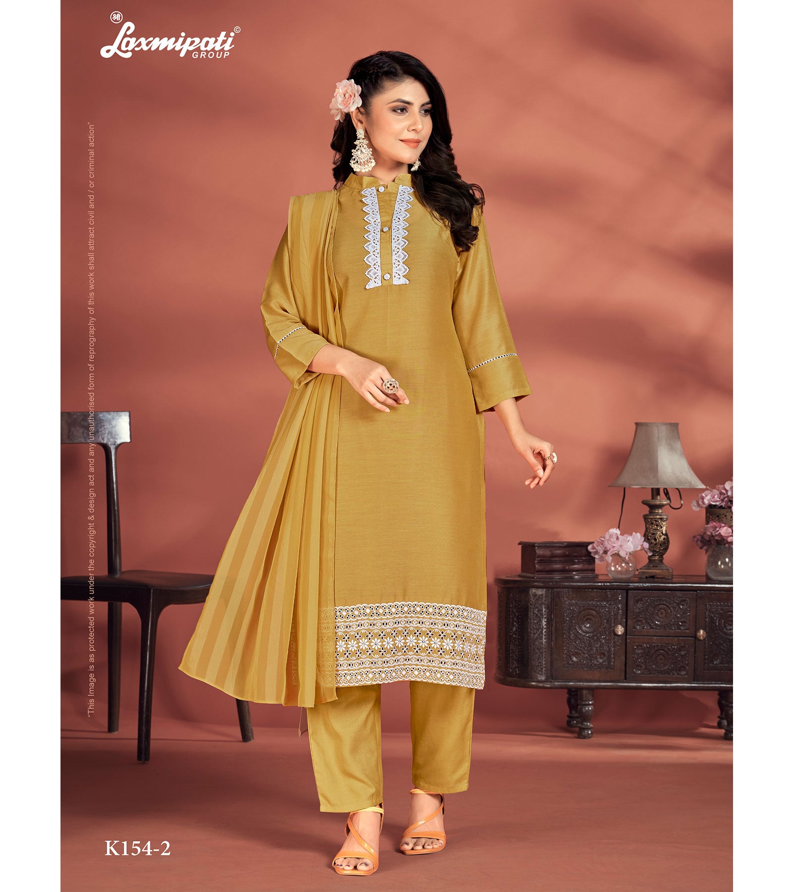 Laxmipati Muslin Base Mustard Embroidered Straight Cut Kurti With Pant & Dupatta