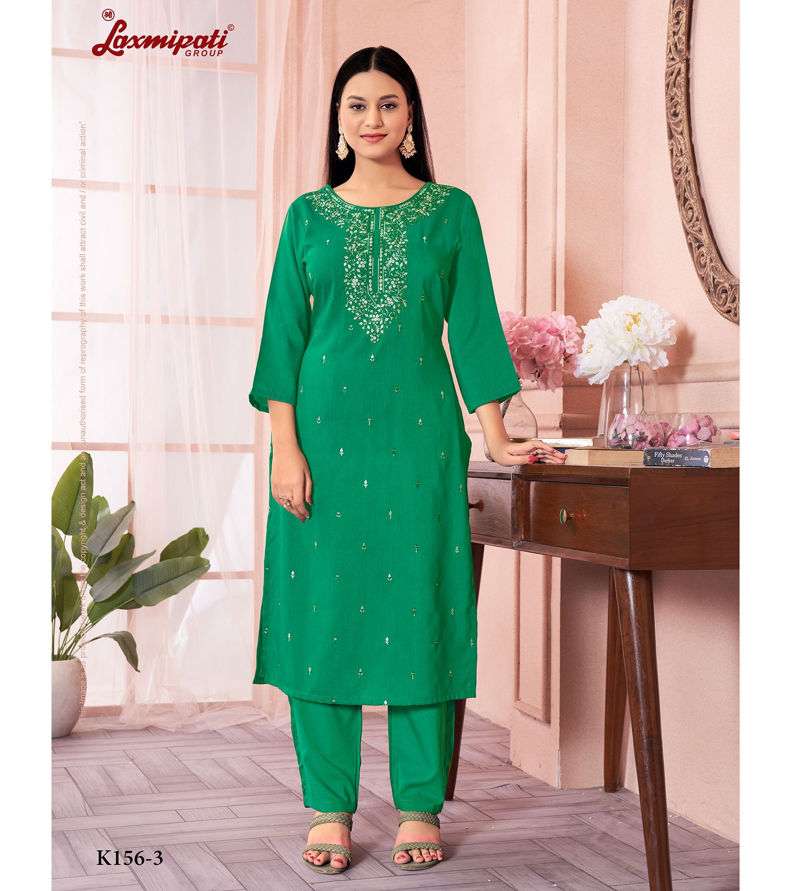 Laxmipati Muslin Base Green Embroidered Straight Cut Kurti