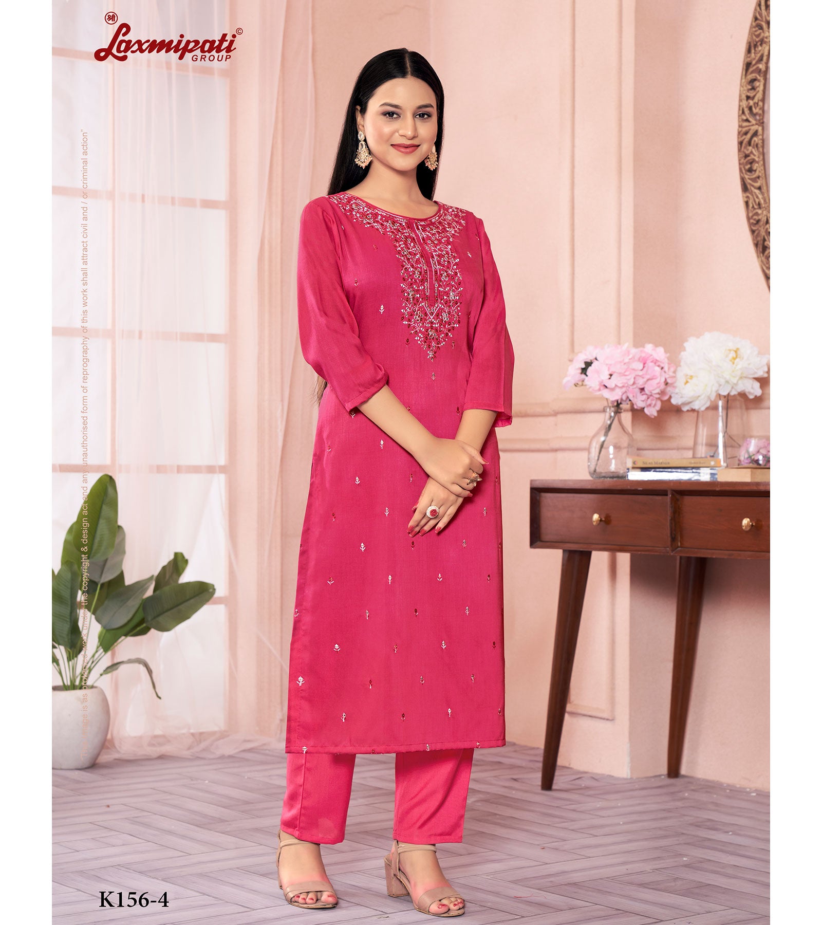 Laxmipati Muslin Base Pink Embroidered Straight Cut Kurti