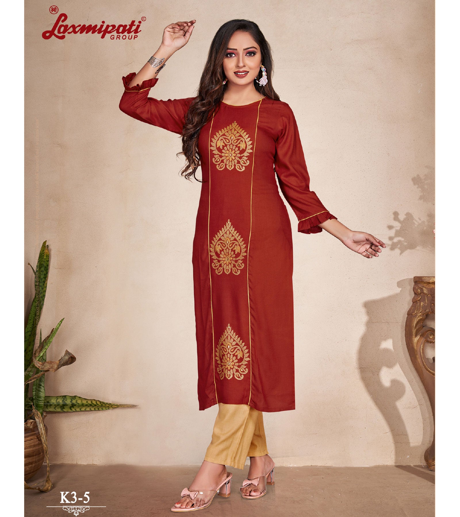 Laxmipati  Rayon Base Rust Straight Cut Kurti