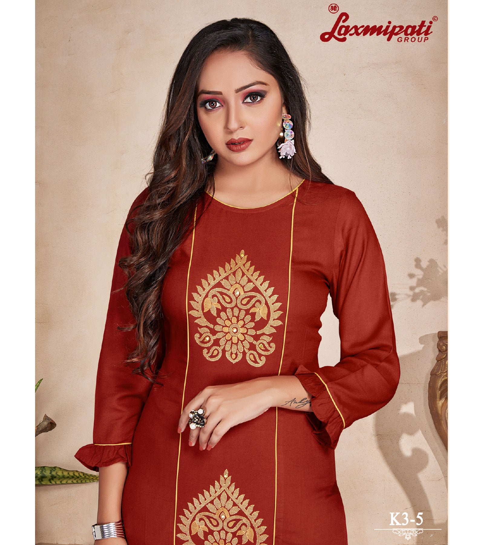 Laxmipati  Rayon Base Rust Straight Cut Kurti