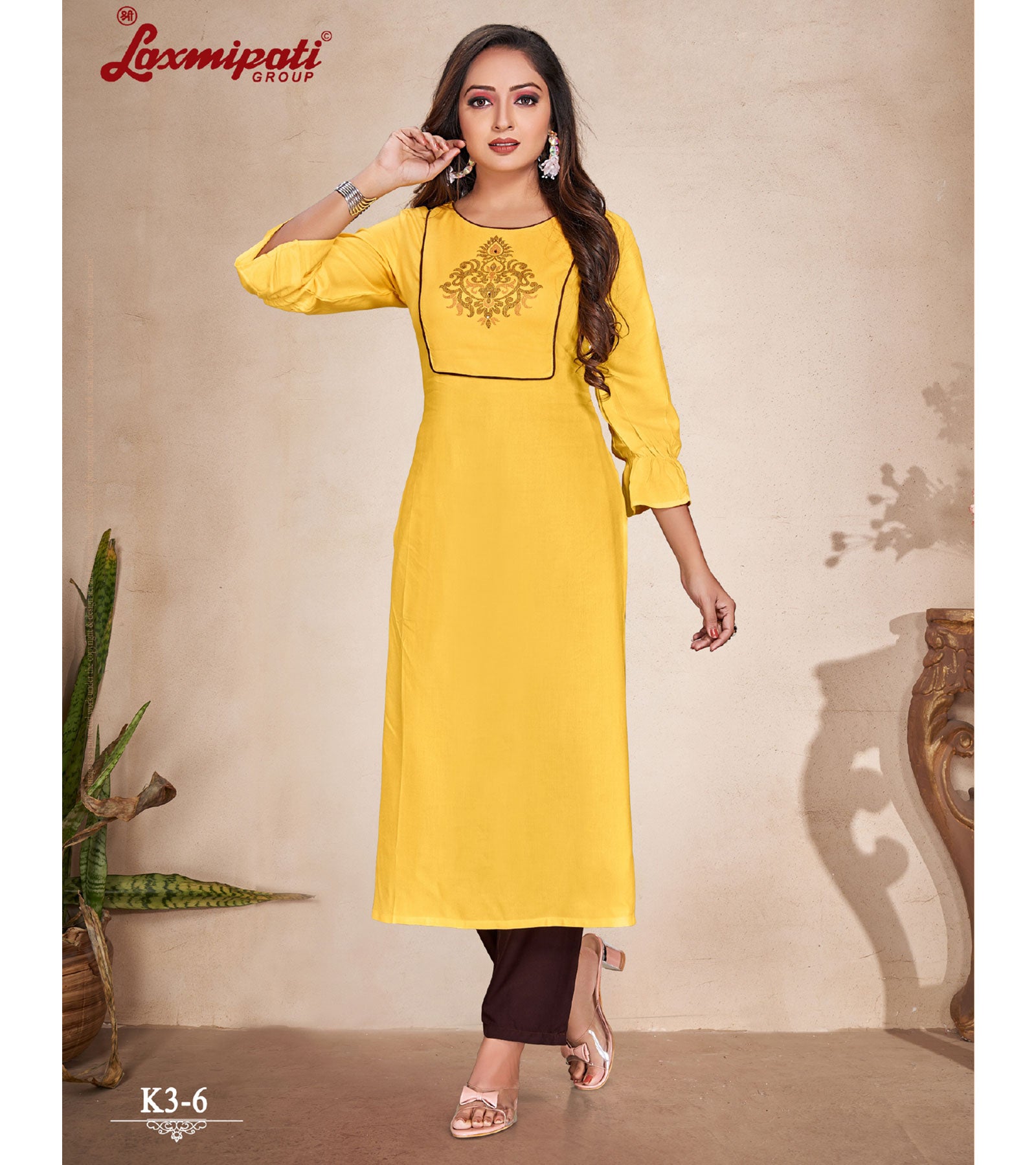 Laxmipati  Rayon Base Yellow Straight Cut Kurti