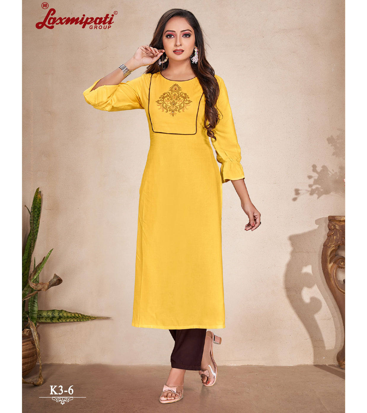 Laxmipati  Rayon Base Yellow Straight Cut Kurti