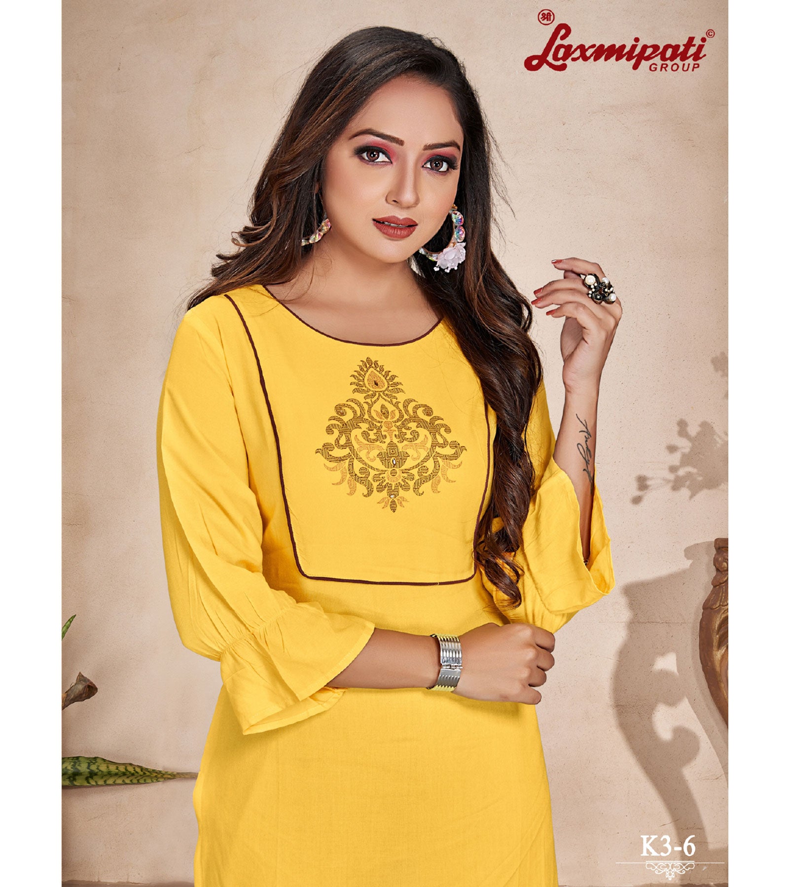 Laxmipati  Rayon Base Yellow Straight Cut Kurti