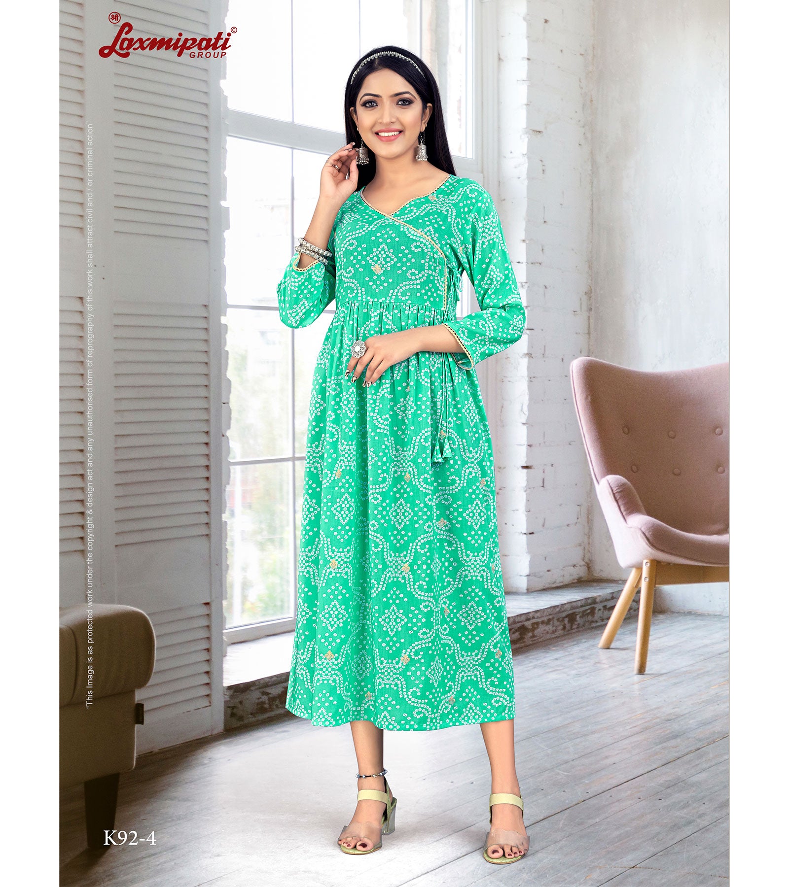 Laxmipati  Muslin Base Turquoise Nayra Cut Kurti