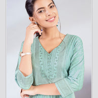 Laxmipati Jasmine Geometric Foil Print Viscose A Line Kurti with Embroidered Neckline in Green Color