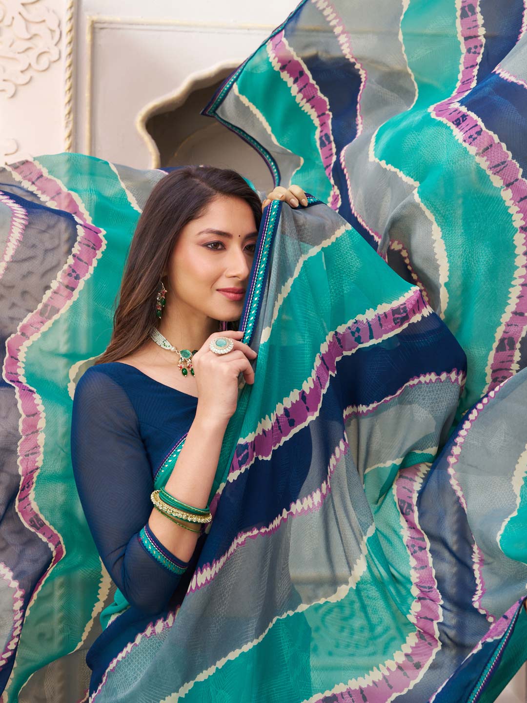 Laxmipati Limca Teal Green Georgette Wavy Printed Saree