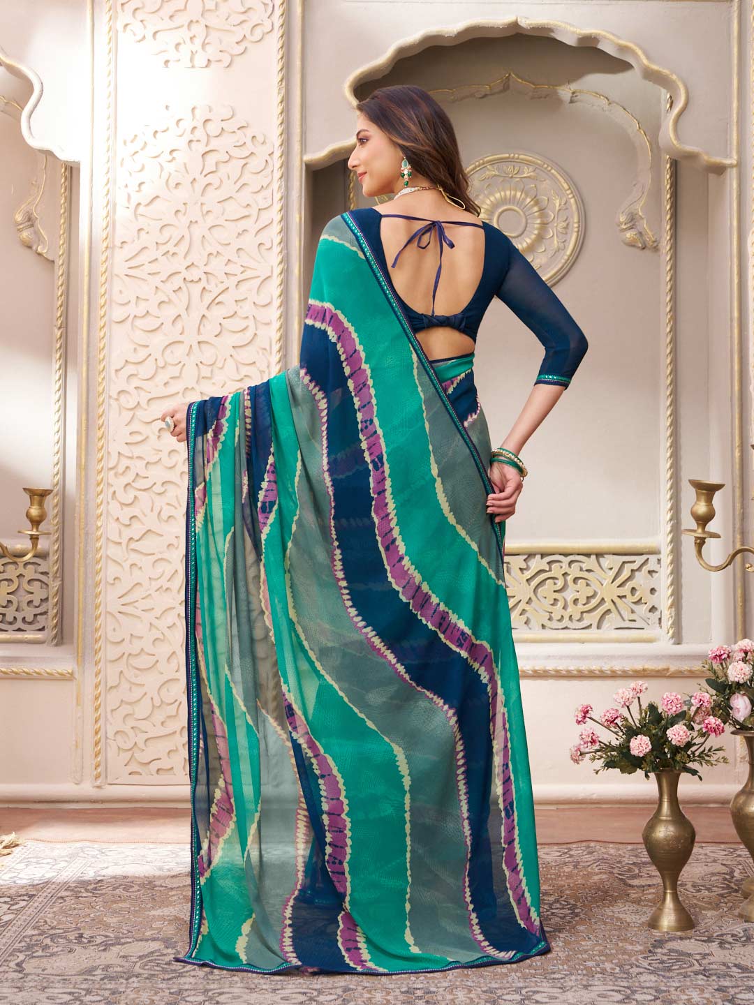 Laxmipati Limca Teal Green Georgette Wavy Printed Saree