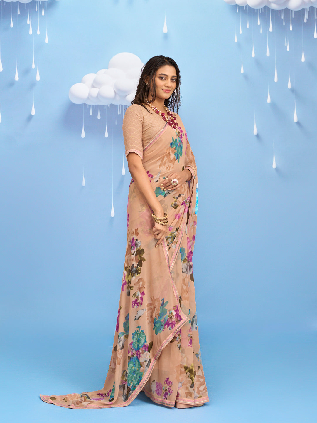 Laxmipati Sadhana Floral Printed Georgette Saree in Brown Color