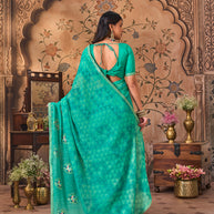 Laxmipati Monaco Embellished Floral Embroidered Chiffon Saree in Teal Blue Color