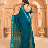 Laxmipati Tohfa Abstract Printed Georgette Saree in Teal Blue Color