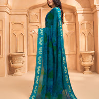 Laxmipati Tohfa Abstract Printed Georgette Saree in Teal Blue Color