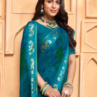 Laxmipati Tohfa Abstract Printed Georgette Saree in Teal Blue Color