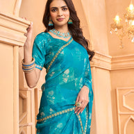 Laxmipati Tohfa Abstract Printed Chiffon Saree in Teal Blue Color