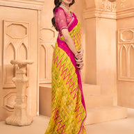 Laxmipati Tohfa Ikkat Printed Chiffon Saree in Yellow Color