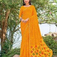 Yellow chiffon bandhani embroidered saree