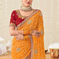Laxmipati Nazakat Floral Embroidered Chiffon Saree in Orange Color with Unstitched Blouse