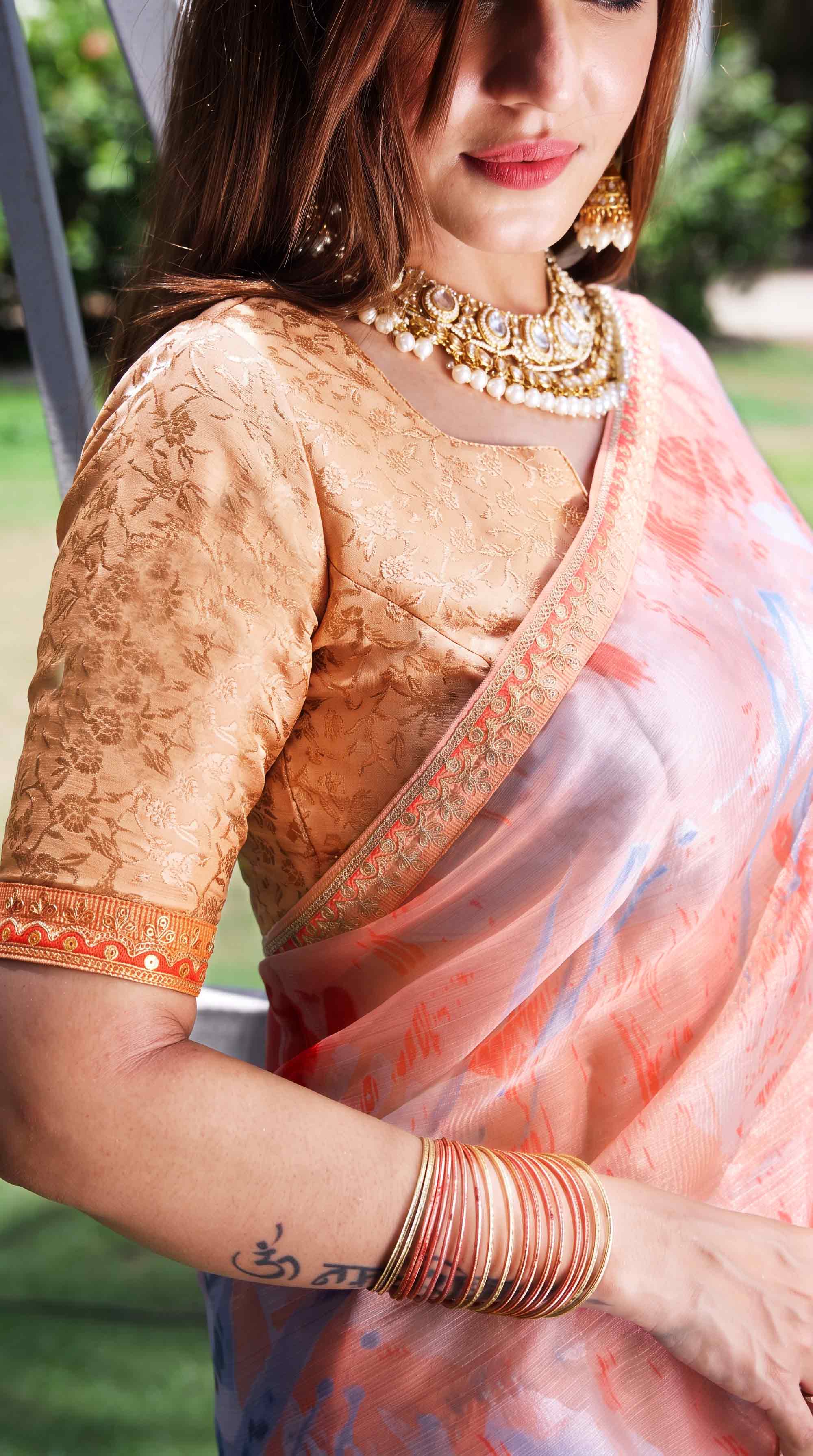 Peach abstract printed tissue saree party wear
