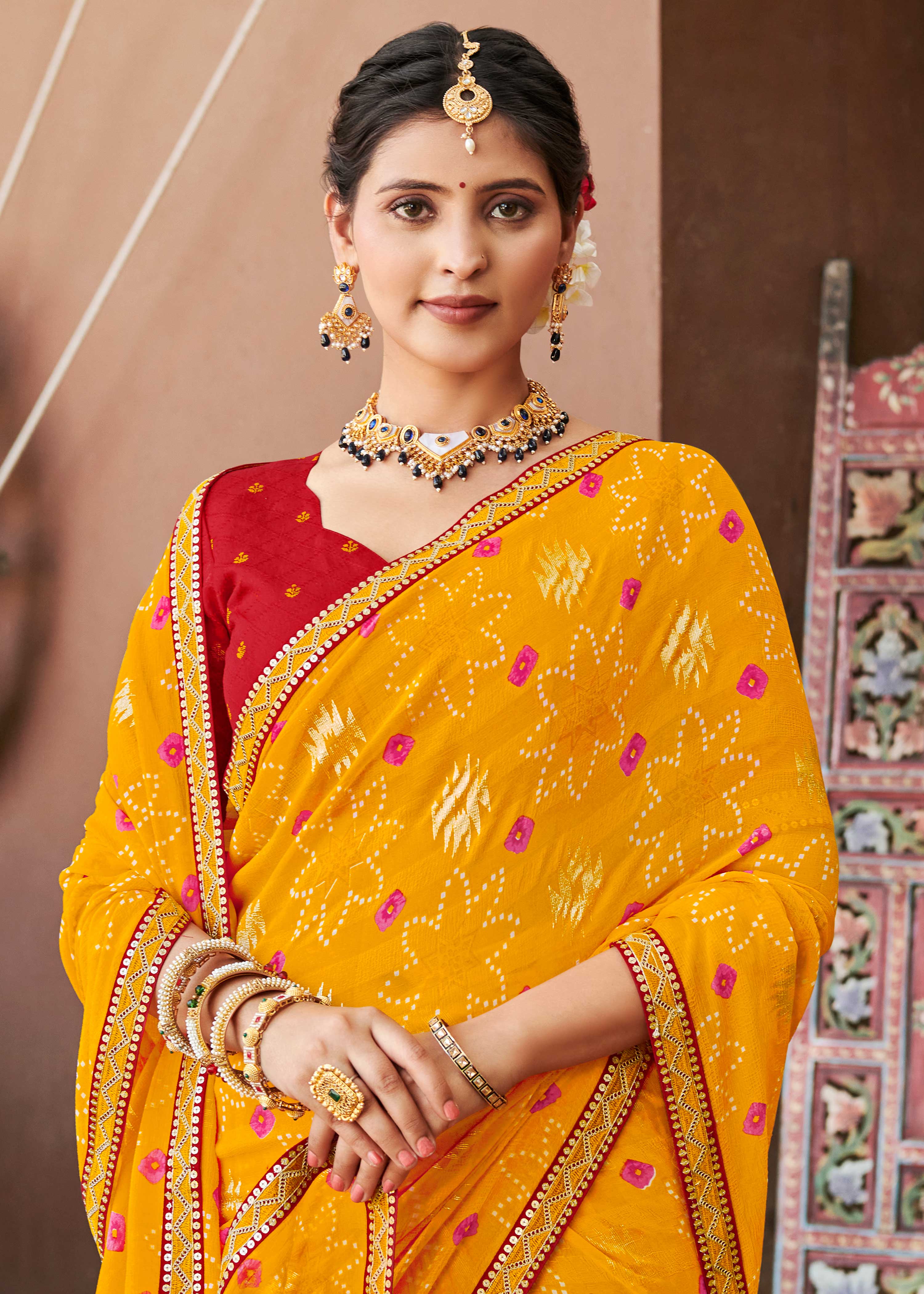 Laxmipati Rajwadi Bandhani Printed Georgette Saree in Orange Color with Unstitched Blouse