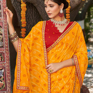 Laxmipati Rajwadi Bandhani Printed Georgette Saree in Orange Color with Unstitched Blouse