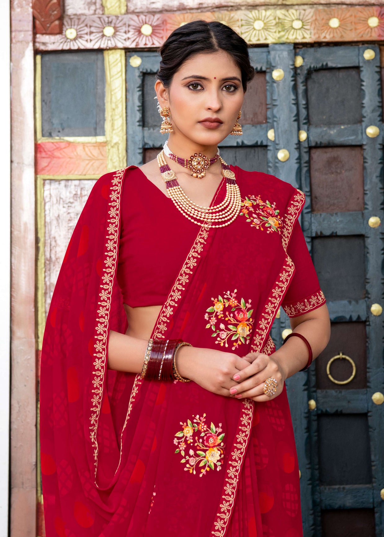 Laxmipati Chanchal Embellished Floral Embroidered Georgette Saree in Red Color with Unstitched Blouse