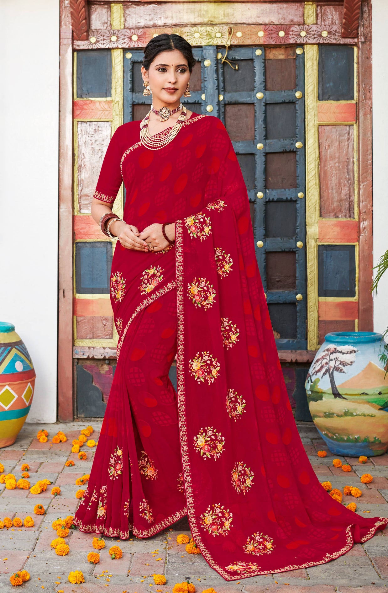 Laxmipati Chanchal Embellished Floral Embroidered Georgette Saree in Red Color with Unstitched Blouse