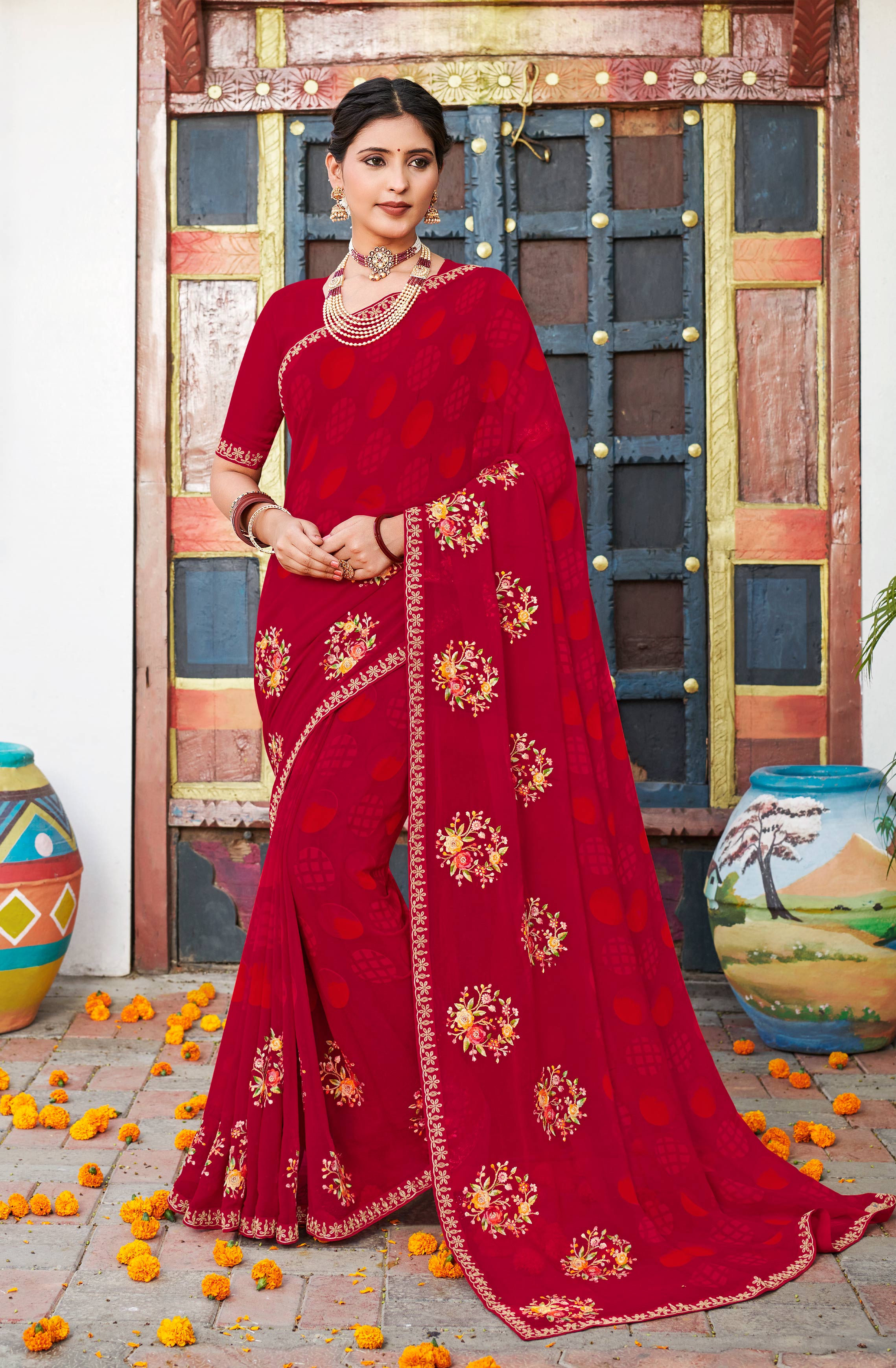 Laxmipati Chanchal Embellished Floral Embroidered Georgette Saree in Red Color with Unstitched Blouse