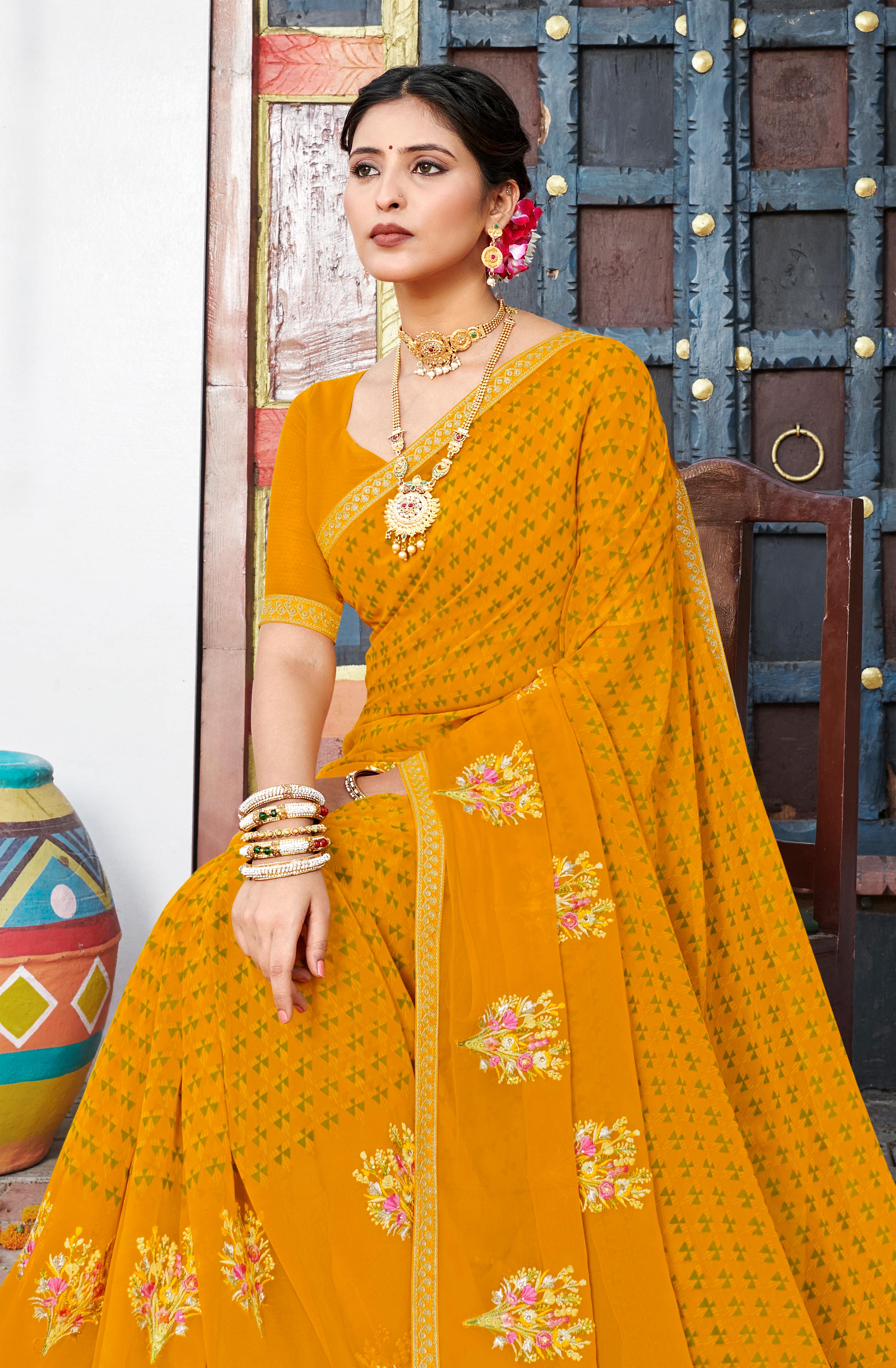 Laxmipati Chanchal Embellished Floral Embroidered Georgette Saree in Mustard Color with Unstitched Blouse