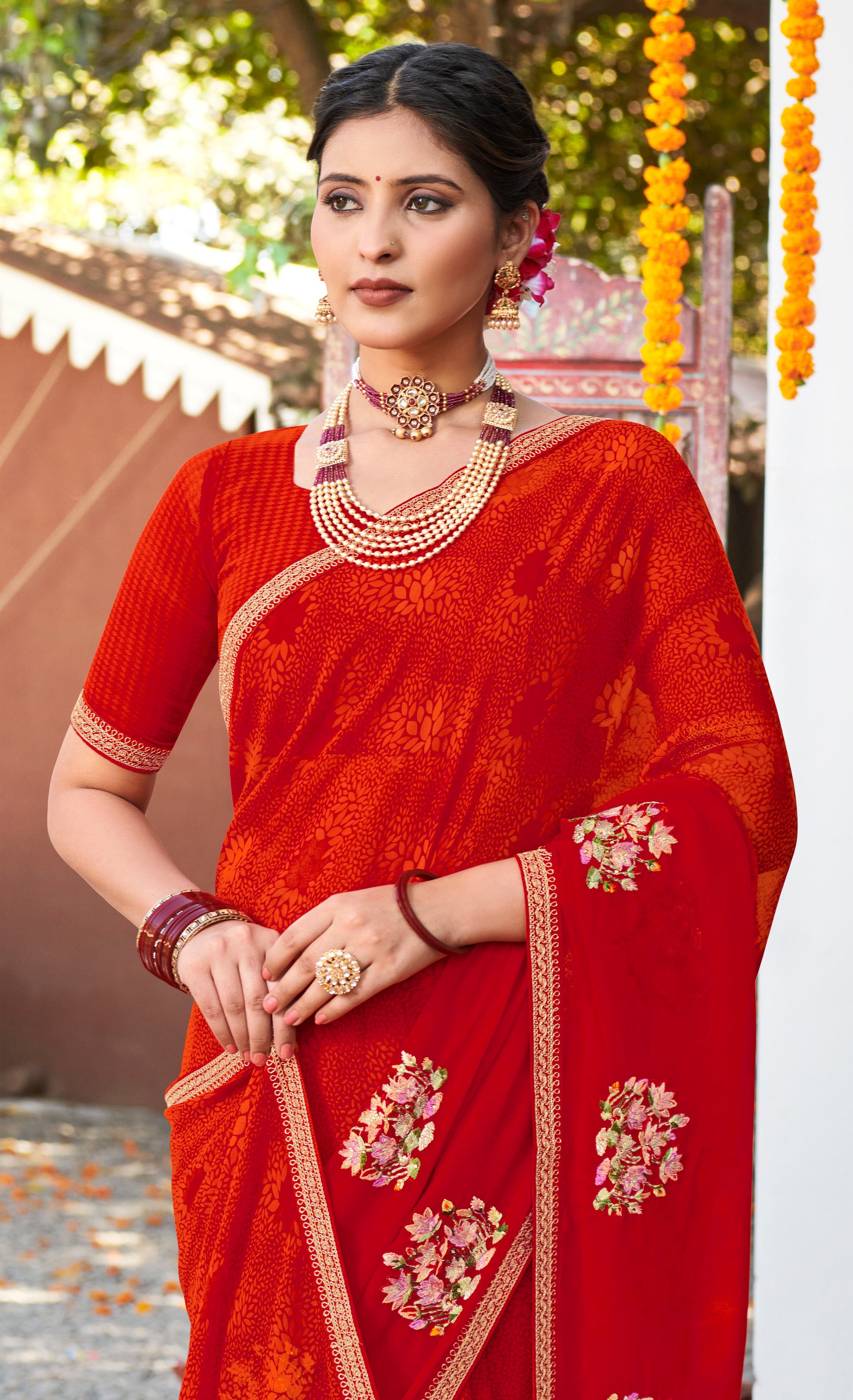 Laxmipati Chanchal Embellished Floral Embroidered Georgette Saree in Deep Red Color with Unstitched Blouse