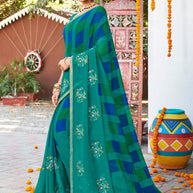 Laxmipati Chanchal Embellished Floral Embroidered Georgette Saree in Teal Blue Color with Unstitched Blouse