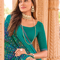 Laxmipati Madhubala Chevron Printed Georgette Saree in Teal Blue Color with Unstitched Blouse