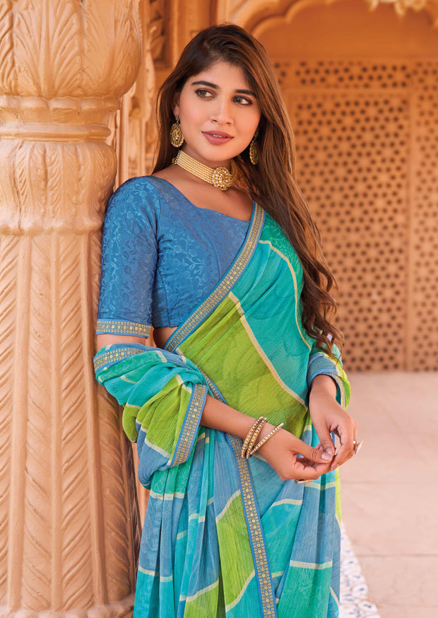 Laxmipati Madhubala Striped Printed Chiffon Saree in Turquoise Blue Color with Unstitched Blouse