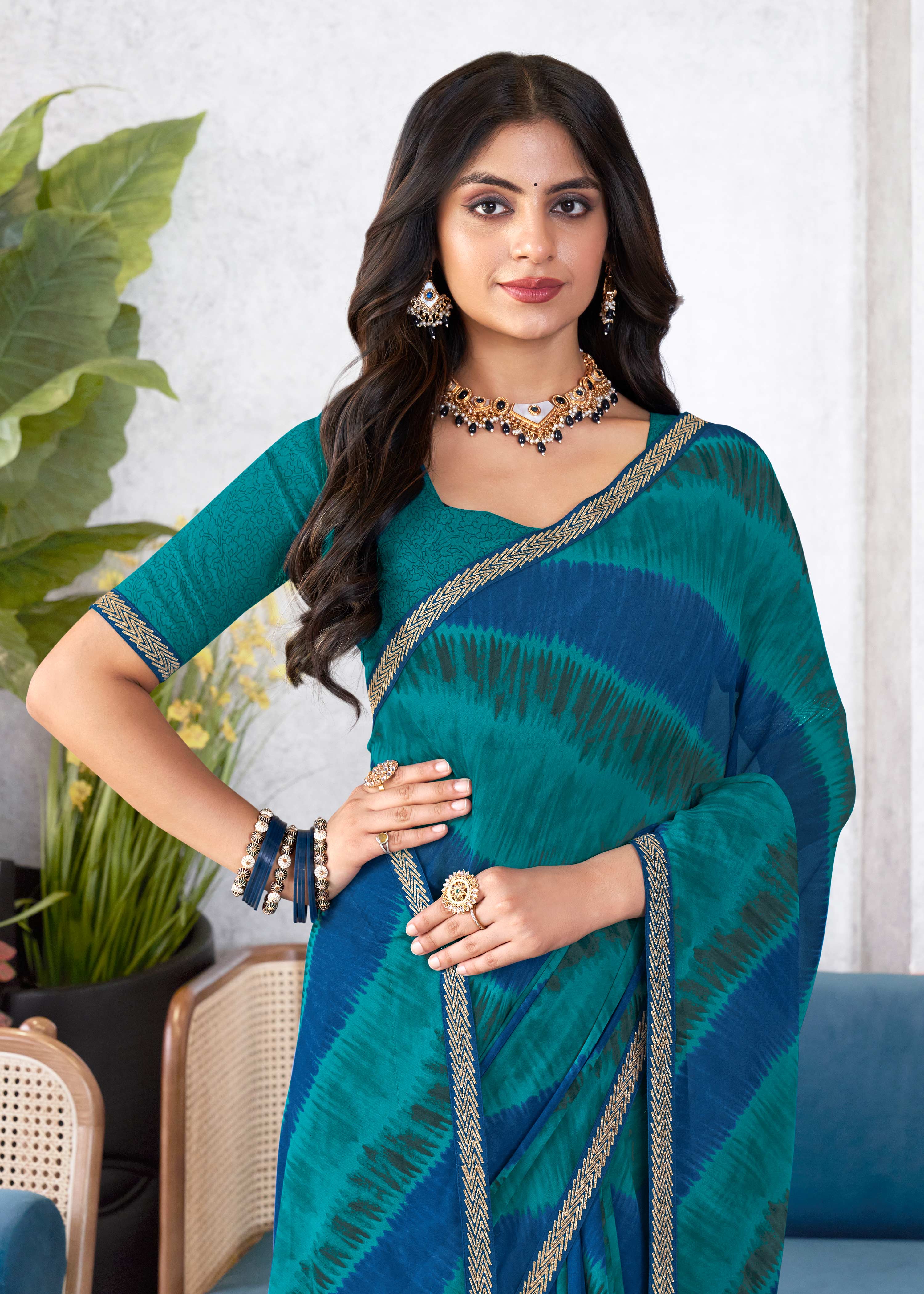 Laxmipati Mala Diagonal Striped Printed Georgette Saree in Teal Blue Color with Unstitched Blouse