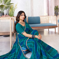 Laxmipati Mala Diagonal Striped Printed Georgette Saree in Teal Blue Color with Unstitched Blouse