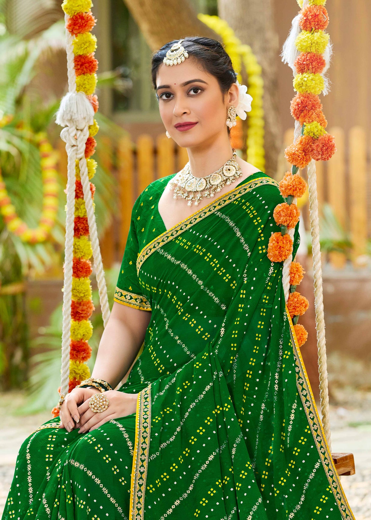 Laxmipati Upavan Bandhani Printed along with Foil Work Georgette Saree in Green Color with Unstitched Blouse