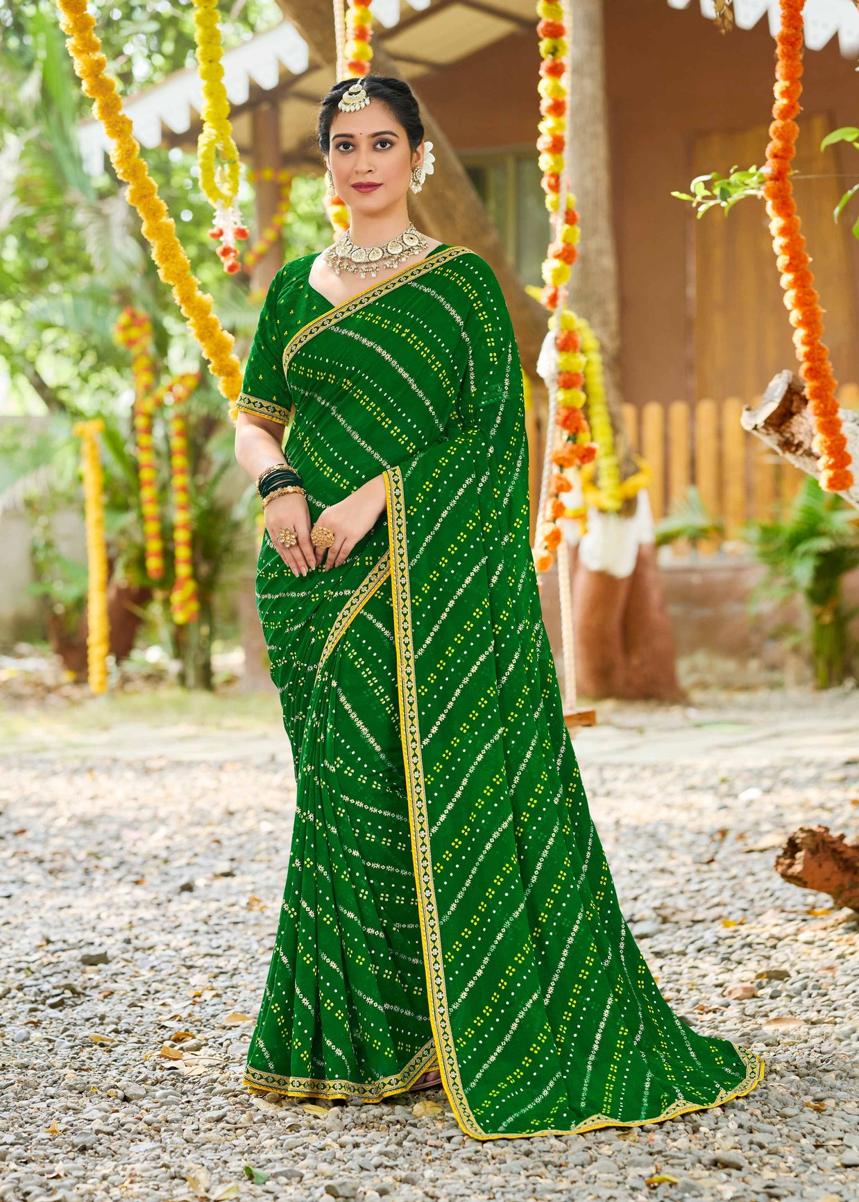 Laxmipati Upavan Bandhani Printed along with Foil Work Georgette Saree in Green Color with Unstitched Blouse