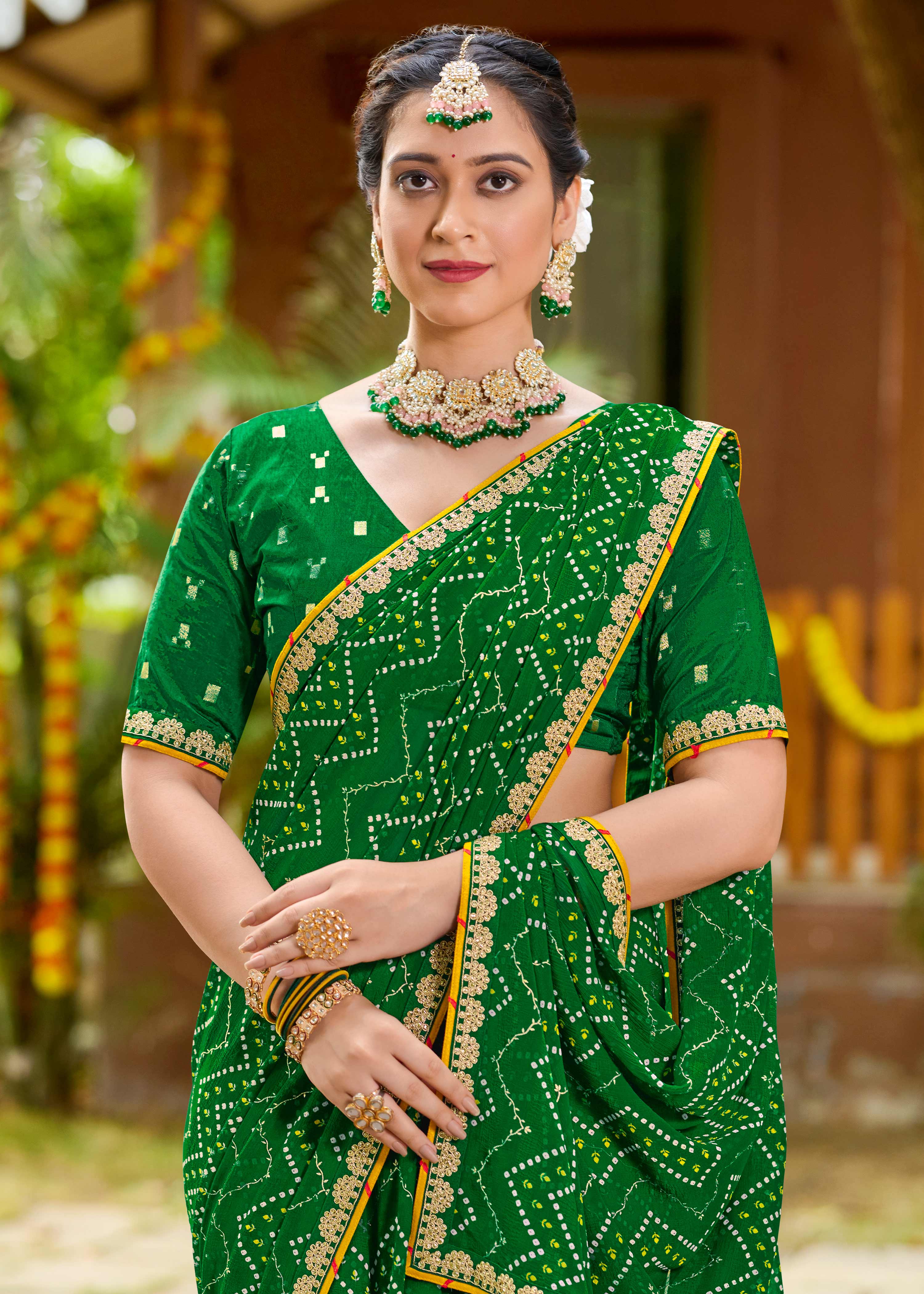 Laxmipati Upavan Bandhani Printed along with Foil Work Georgette Saree in Green Color with Unstitched Blouse