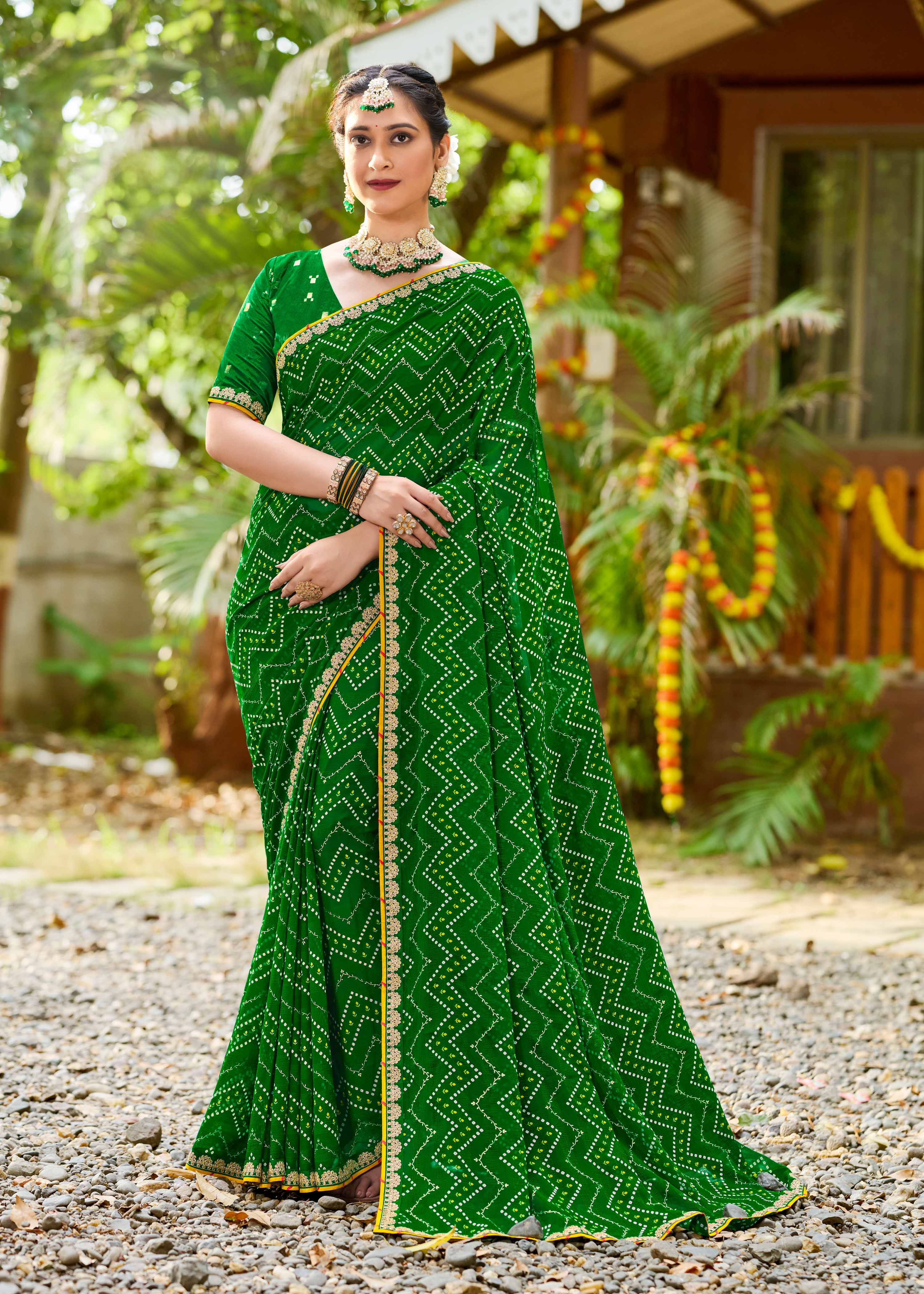 Laxmipati Upavan Bandhani Printed along with Foil Work Georgette Saree in Green Color with Unstitched Blouse