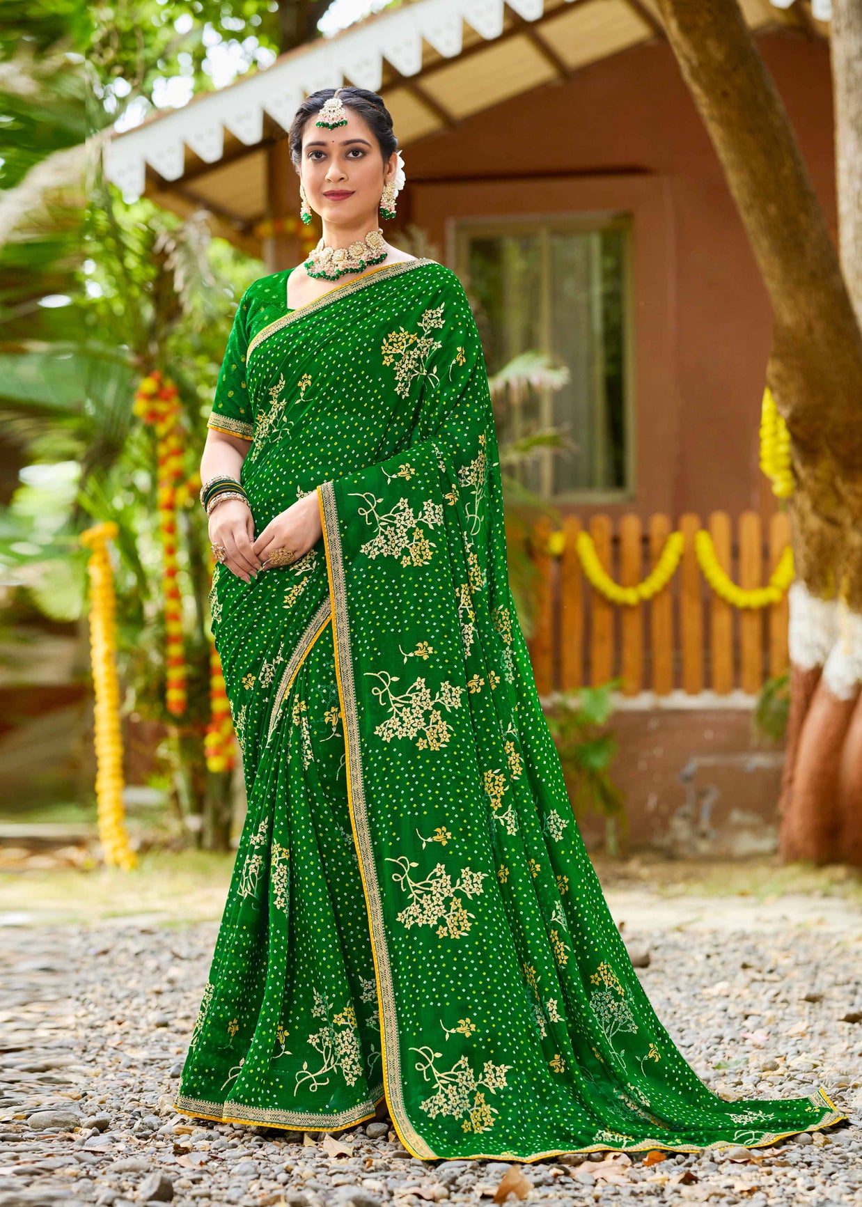 Laxmipati Upavan Bandhani Printed along with Foil Work Georgette Saree in Green Color with Unstitched Blouse