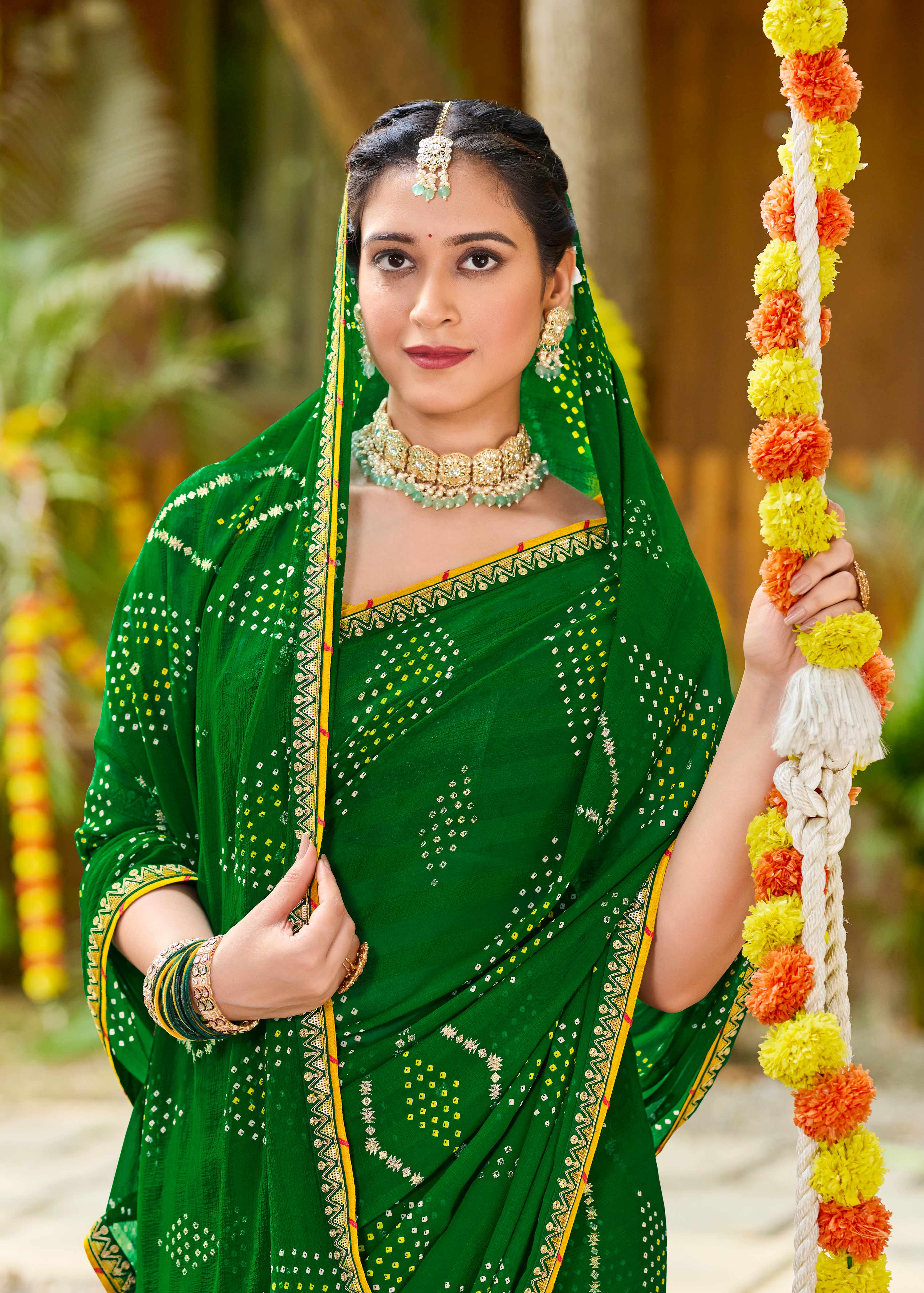 Laxmipati Upavan Bandhani Printed along with Foil Work Georgette Saree in Green Color with Unstitched Blouse