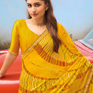 Laxmipati Baarish Abstract Printed Chiffon Saree in Mustard Color with Unstitched Blouse