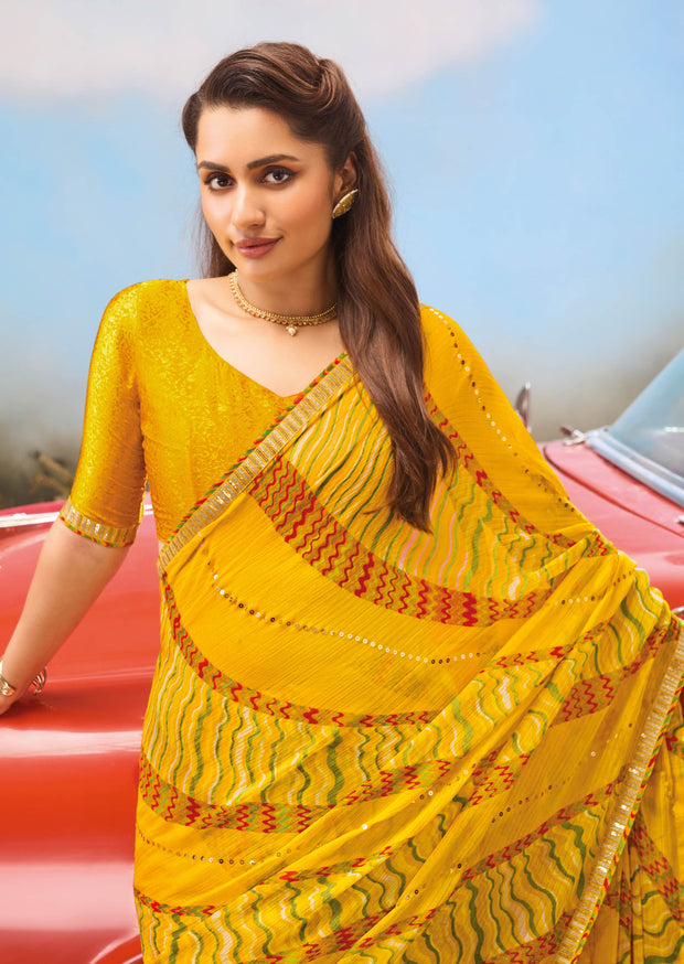 Laxmipati Baarish Abstract Printed Chiffon Saree in Mustard Color with Unstitched Blouse
