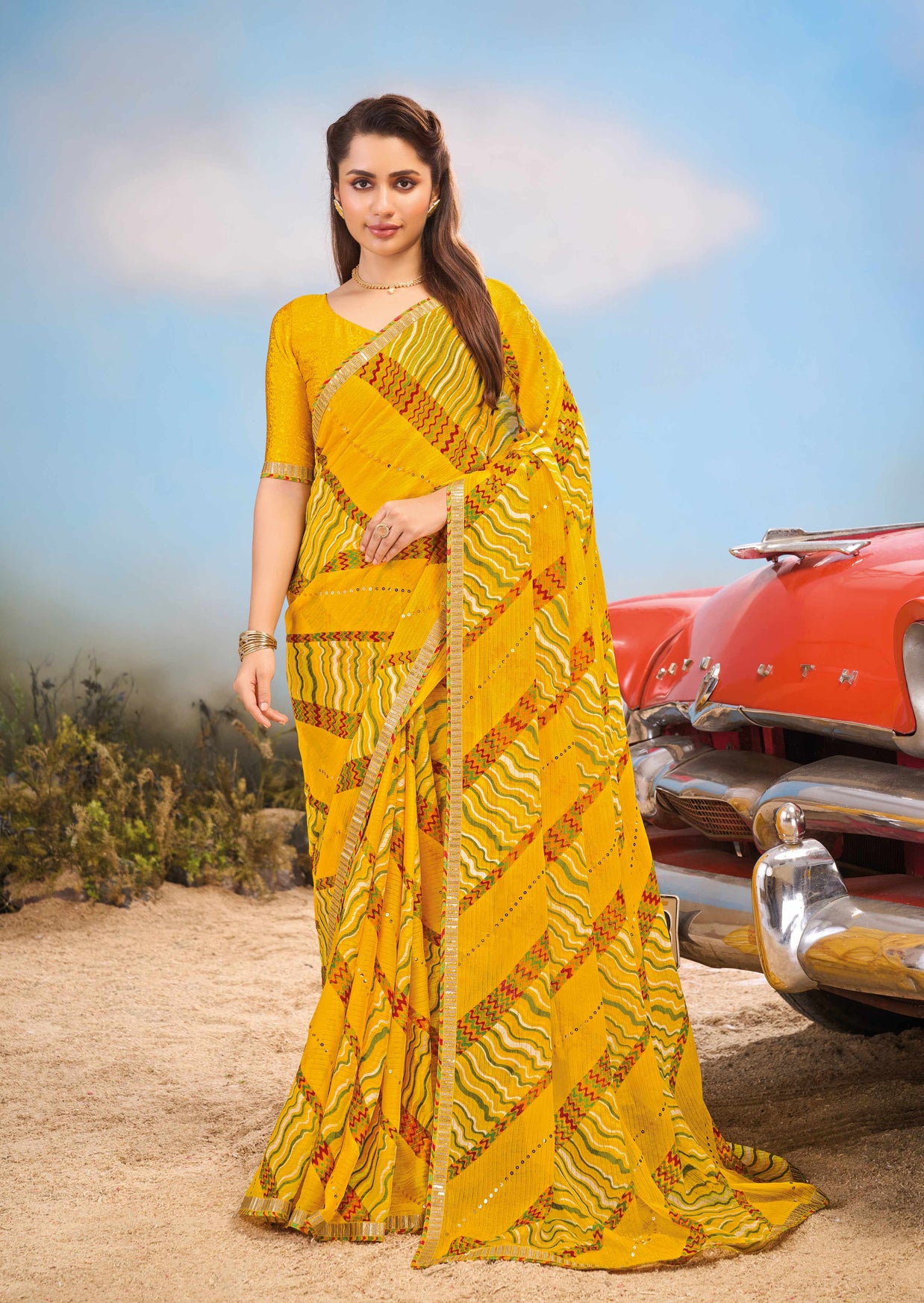 Laxmipati Baarish Abstract Printed Chiffon Saree in Mustard Color with Unstitched Blouse