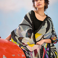 Laxmipati Baarish Abstract Printed Georgette Saree in Black Color with Unstitched Blouse