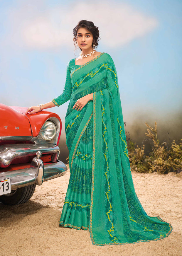 Laxmipati Baarish Abstract Printed Chiffon Saree in Teal Green Color with Unstitched Blouse